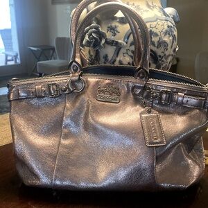 COACH metallic, silver.  Blue lining. Gorgeous handbag for glitter nights!